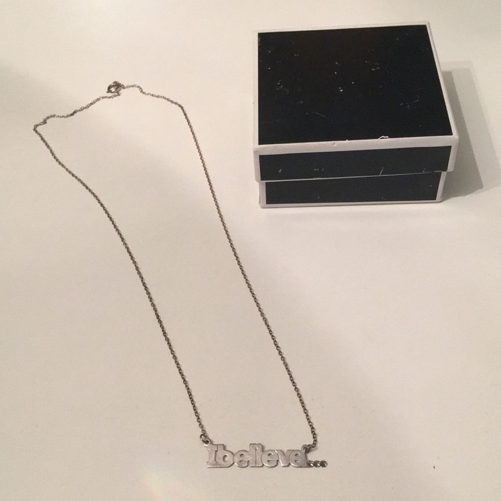 I believe silver necklace.